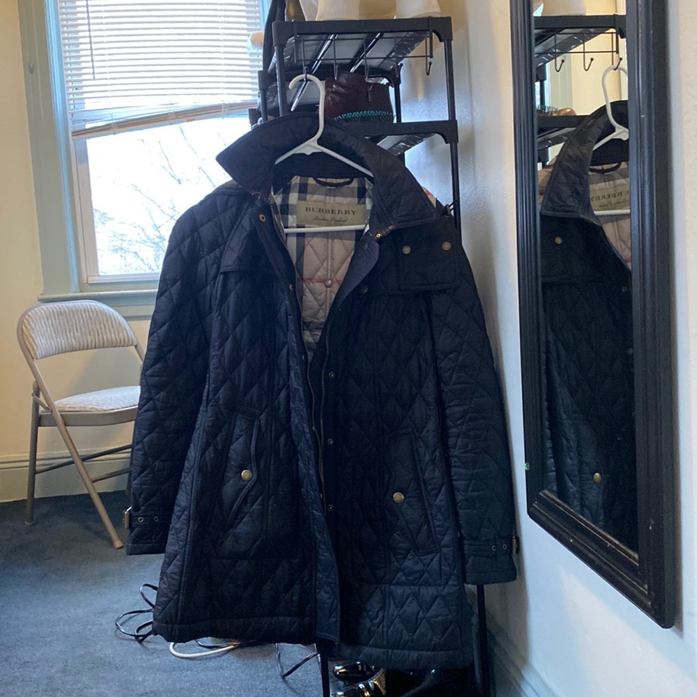 Worn once Burberry jacket with hood and belt.